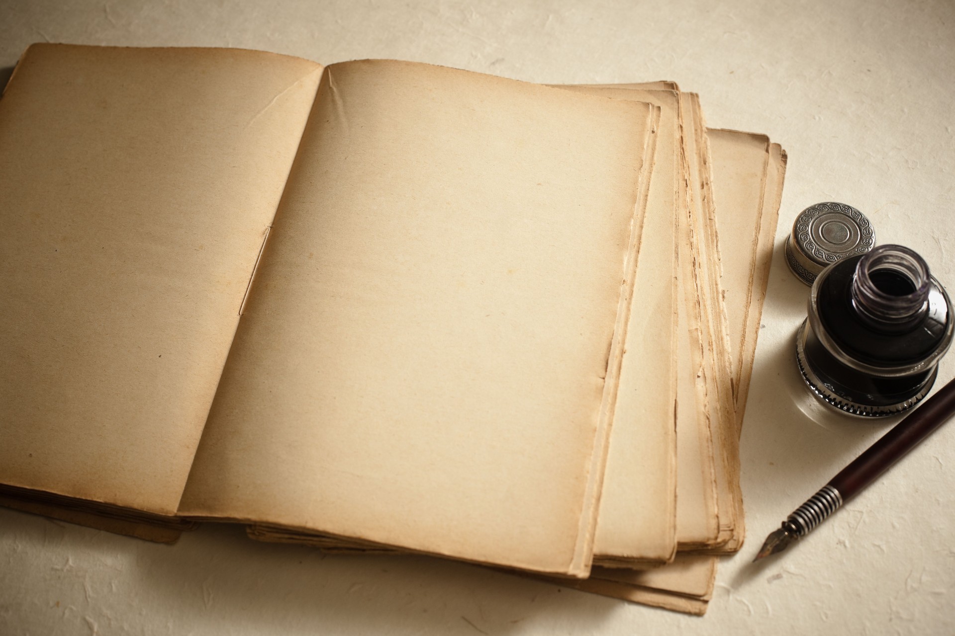 Pen and old book